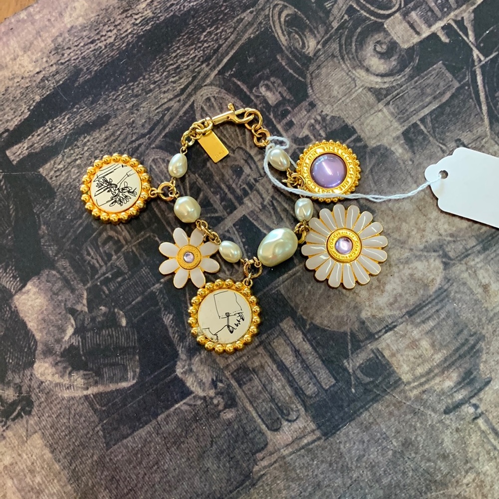 A coach braclet with many pretty colors